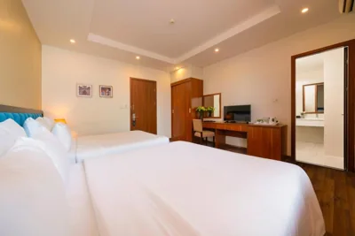 Deluxe vierpersoonskamer — The Embassy Hotel Hanoi